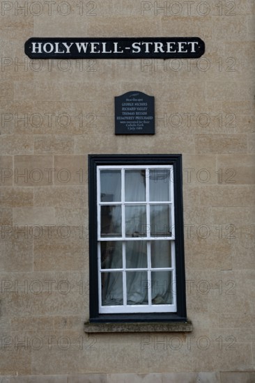 Oxford, England, UK. February 2nd, 2020 A window and plaque on Hollywell Street in the University