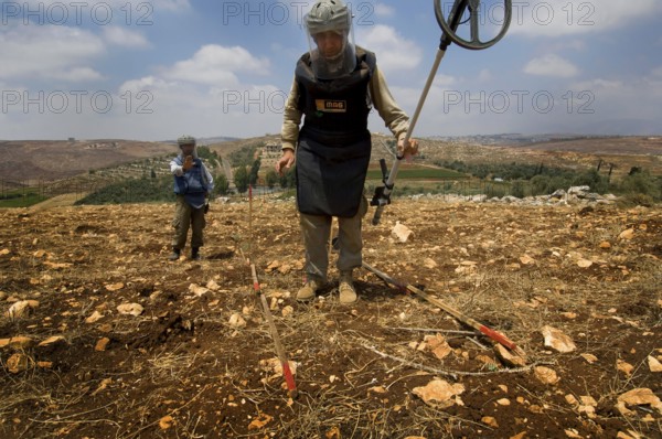Tyre, Lebanon. July 15th 2010 A team from The Mines Advisory Group (MAG) clearing unexploded