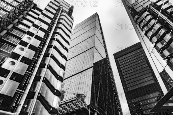 Modern black and white abstract reflections in glass fronted office buildings in the financial