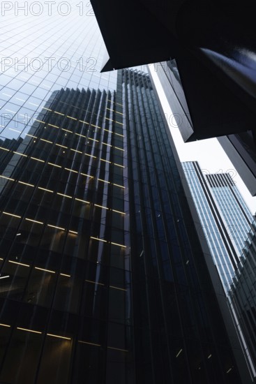 Modern abstract reflections in glass fronted office buildings in the financial district of the