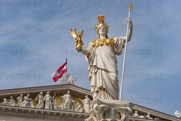 Vienna, Austria. October 5th 2023 Carved figures on the roof of the Parliament Building, part of a