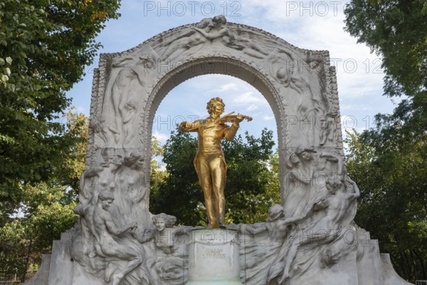 Vienna, Austria. October 5th 2023 The golden statue of Johann Strauss Jr in the Stadtpark, part of