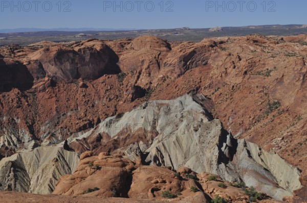 View of impressive red rock formations in a deep canyon, Canyonlands National Park, Island in the
