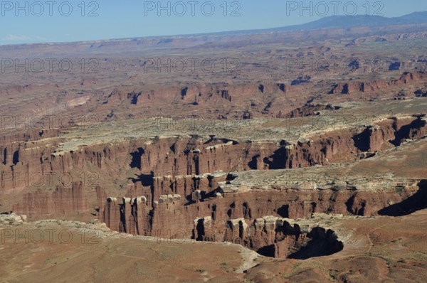 Wide canyon landscape with deeply cut gorges and red rocks, Canyonlands National Park, Island in