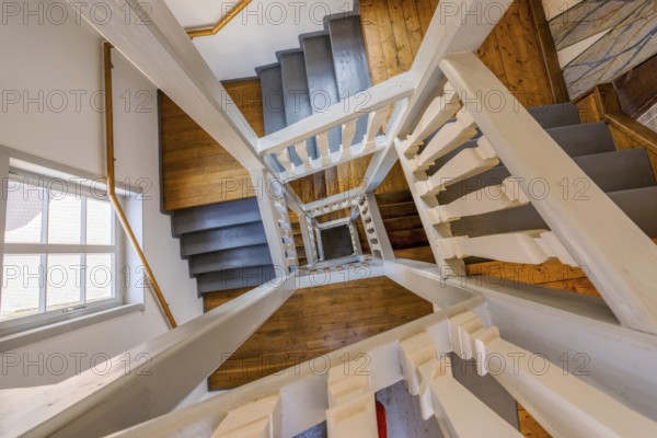 Prinzenhof interior historic staircase with doge railing Rinteln Germany