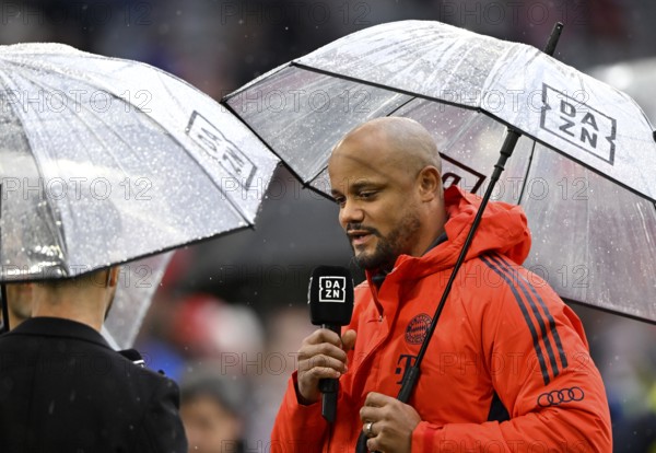 Coach coach Vincent Kompany FC Bayern Munich FCB portrait under screen in interview microphone