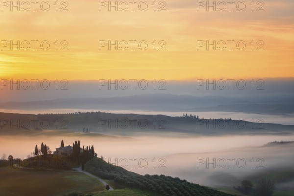 A breathtaking sunrise over the rolling hills of Val d Orcia, Tuscany, with a traditional farmhouse