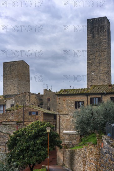 A panoramic view of San Gimignano, highlighting its famous medieval towers and traditional stone