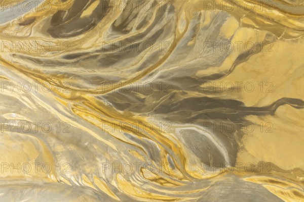 This image showcases a captivating abstract texture with flowing patterns resembling a marble