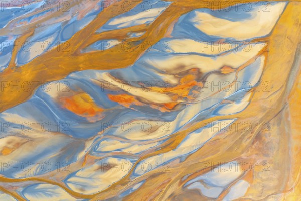 This image showcases a vibrant abstract design with swirling multicolor patterns, resembling fluid