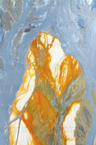 Vibrant multicolor abstract texture featuring dynamic orange and blue hues The flowing patterns