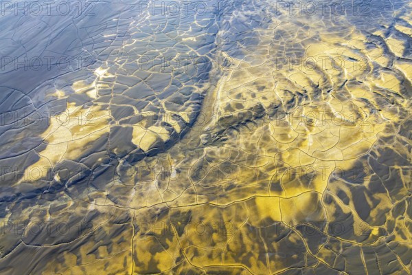 Aerial view of multicolor mud patterns, showcasing intricate textures and natural beauty The