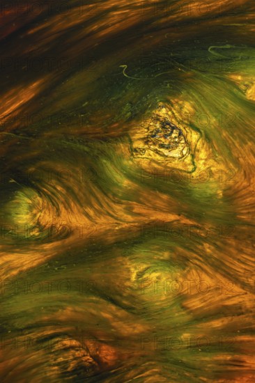 A stunning abstract of Riotinto river in Huelva, Spain, showcasing vivid orange and green hues The