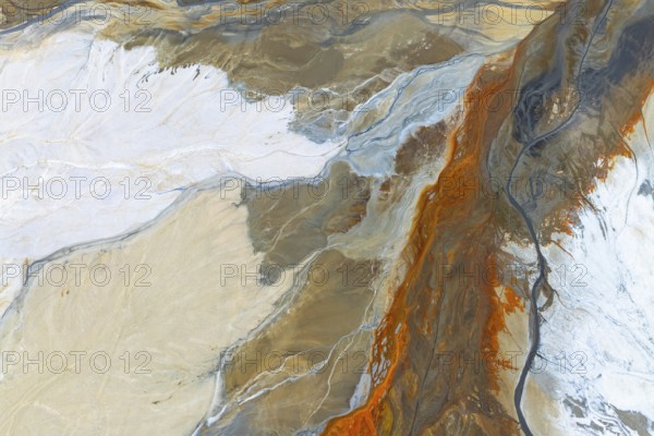 A vibrant abstract composition in earthy tones with flowing patterns, evoking natural landscapes