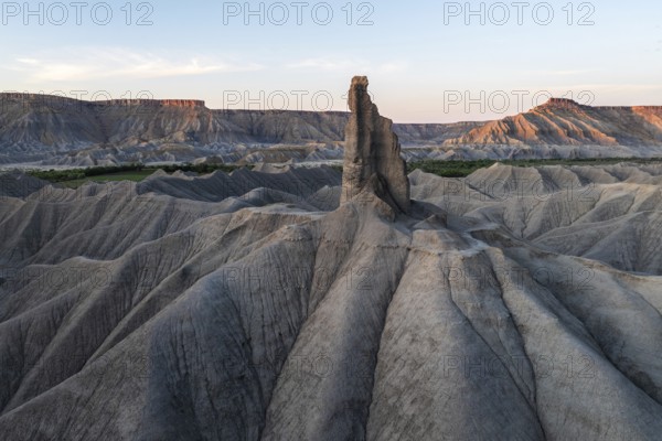 Captivating view of Caineville Mesa, Utah, showcasing striking erosion patterns and rugged terrain