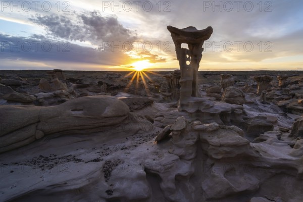 Captivating sunrise over unique hoodoo formations in Bisti De-Na-Zin Wilderness, New Mexico, USA