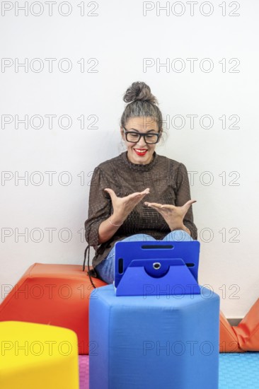 An engaging instructor teaches sign language through an online platform She's animated and