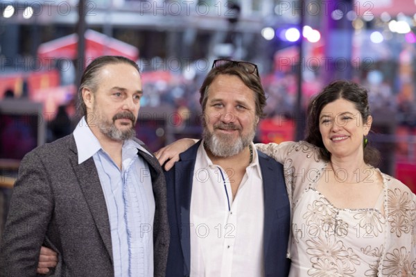 Banker White, Andy Mitchell, Anna Fitch on the Red Carpet in front of the closing gala of the 76th