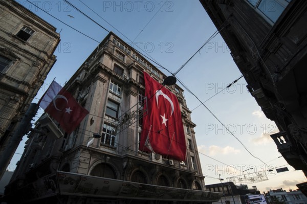 Istanbul, Turkey. July 2rd 2016 Turkish flag hanging from a European style building in the Beyoglu
