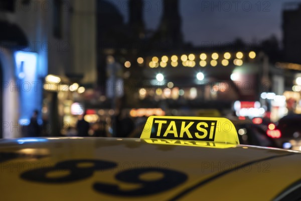 Istanbul Turkey. October 23rd 2021 Yellow Turkish Taxi Sign at night in Taksim Square Istanbul, the