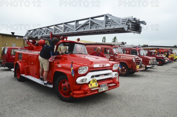 GMC veteran fire truck built in 1959 at a row of fire trucks at fire truck rally in Ystad, Skåne