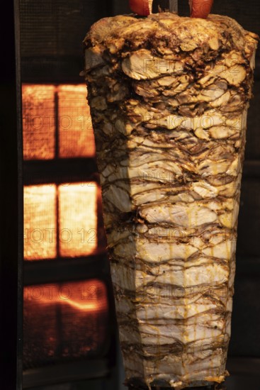 Istanbul, Turkey. November 30th 2020 Layers of Turkish Kebab meat cooking on a skewer in Istiklal