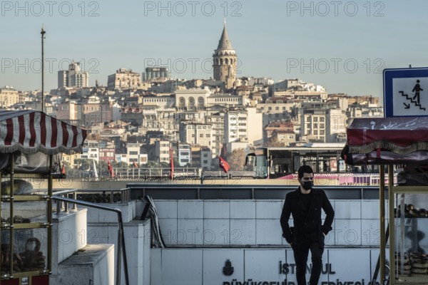 Istanbul, Turkey. November 28th 2020 A man wearing a surgical face mask in Istanbul, wearing masks