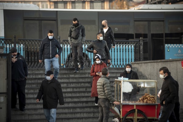 Istanbul, Turkey. November 28th 2020 Turkish commuters in the Fatih district of Istanbul wearing