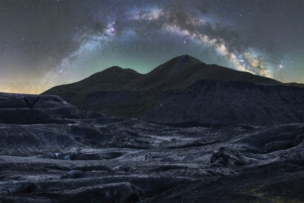 Captivating Icelandic terrain under a stunning starry sky The Milky Way arcs gracefully above,