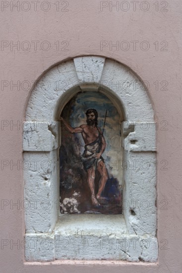 A fresco of saints in a niche, Venice, Veneto, Italy