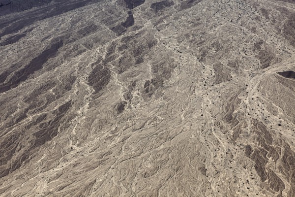 Detailed illustration of a dry riverbed with complex earth formations and exemplary textures in a