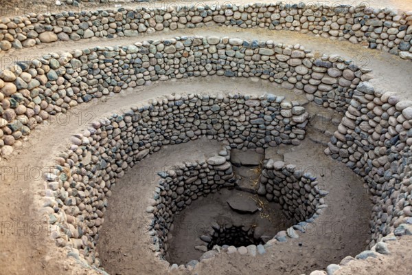 Large spiral of stones spiralling into the ground, The ancient Nazca fountains (Puquios) near