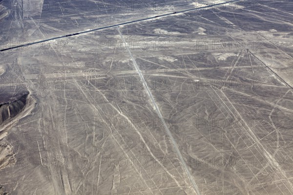 Ancient Nazca lines and patterns on the surface of an extensive desert landscape, the geoglyphs and