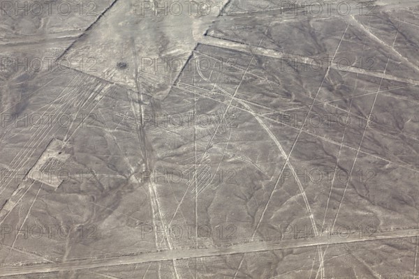 Geometric patterns of the Nazca lines in an arid desert region, seen from the air, The geoglyphs