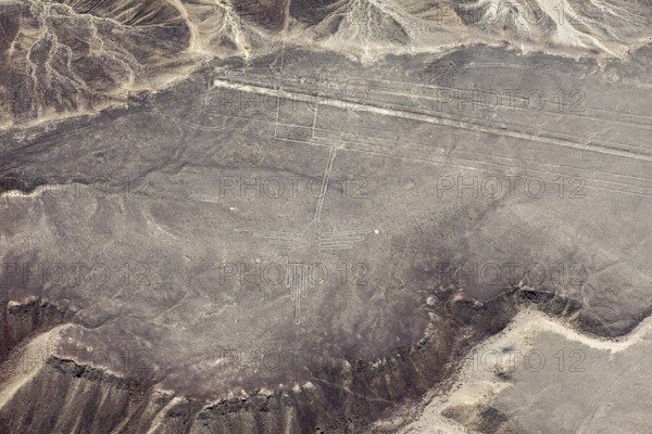 Aerial view of the Nazca Lines, with mysterious formations etched into the desert, the geoglyphs