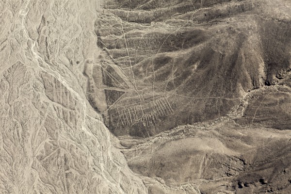 Aerial view of line patterns that run through the inhospitable desert landscape, the geoglyphs and