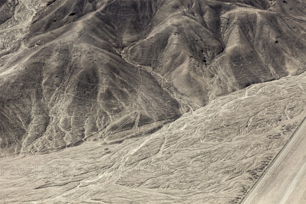 Hilly desert area with interlocking patterns and lines, the geoglyphs and drawings in the desert