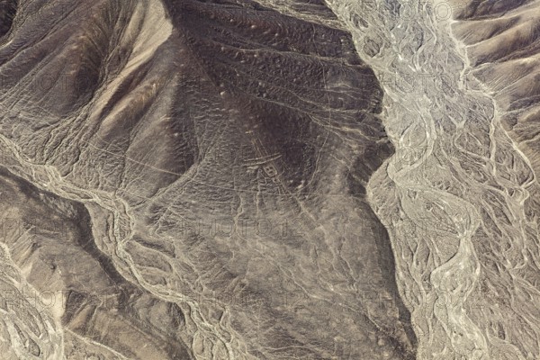 Detailed lines and patterns on a geologically distinctive desert area, the geoglyphs and drawings