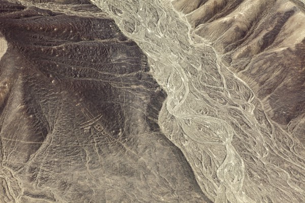 Dry desert hills with clear lines and patterns from the air, the geoglyphs and images in the desert