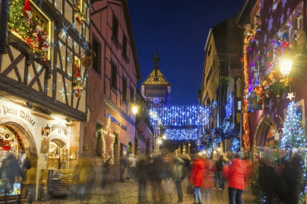 Colour-illuminated and Christmassy decorated half-timbered houses, blue hour, Christmas market,