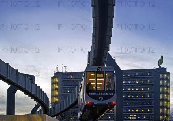 The H Bahn, an automatically controlled large cabin suspension railway in front of the Mathetower
