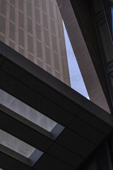 From below image captures the intricate textures and contrasting colors of modern architectural