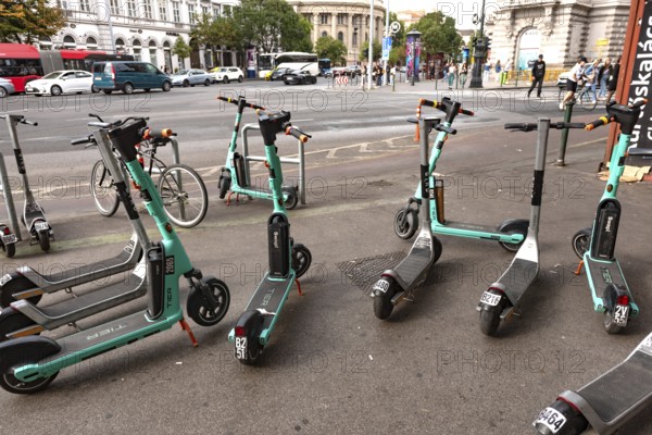 Budapest, Hungary. October 1st 2023 A group of Swap rental scooters parked on the pavement in
