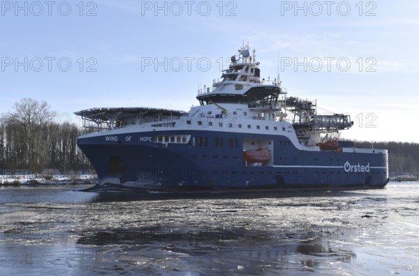 Service vessel, residential ship, offshore ship WIND OF HOPE sails in the icy Kiel Canal, NOK, Kiel