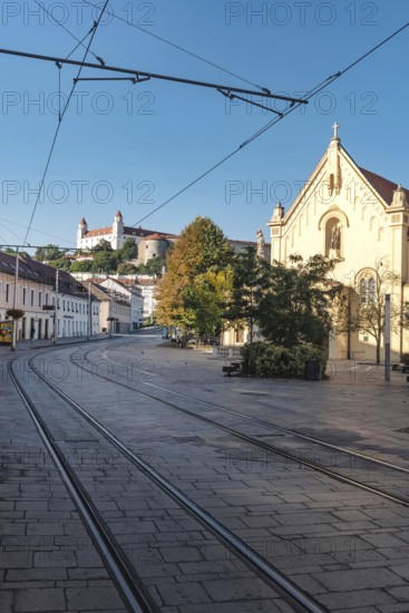 Bratislava, Slovakia. October 2nd 2023 Bratislava Castle overlooking the Little Carpathians above