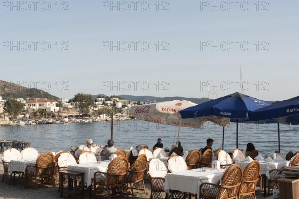 Bodrum, Turkey. April 23rd 2022 Turkish restaurant on the beach of Bodrum harbour, a popular