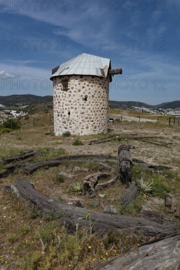 One of the partially restored Bodrum Windmills, overlooking Gumbet bay and Bodrum Marina, a local