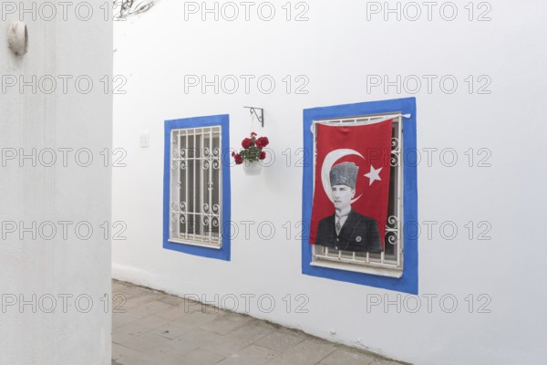 Bodrum, Mugla, Turkey. April 23rd 2022 Pretty blue painted windows in the charming side streets of
