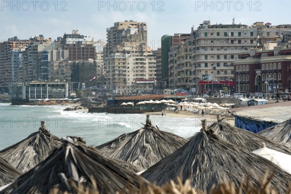 Alexandria, Egypt. December 2nd 2022 Apartment buildings and informal beach side stalls and