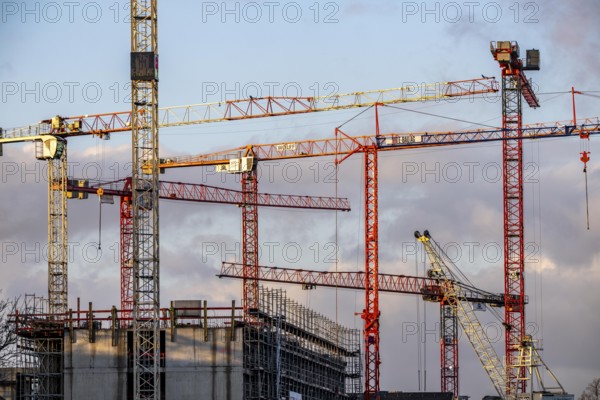 Construction cranes on 2 large construction sites Wohnbau, Geschäftsgebäude, Krefeld North